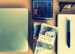 laptop claculator and money