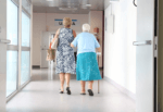 Photo of a patient in hospital corridor