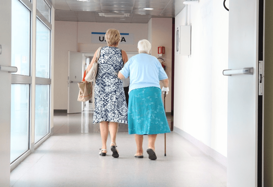 Photo of a patient in hospital corridor