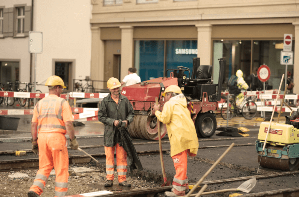 Photo of builders working for Stevenson Farmer review of mental health and employers blog