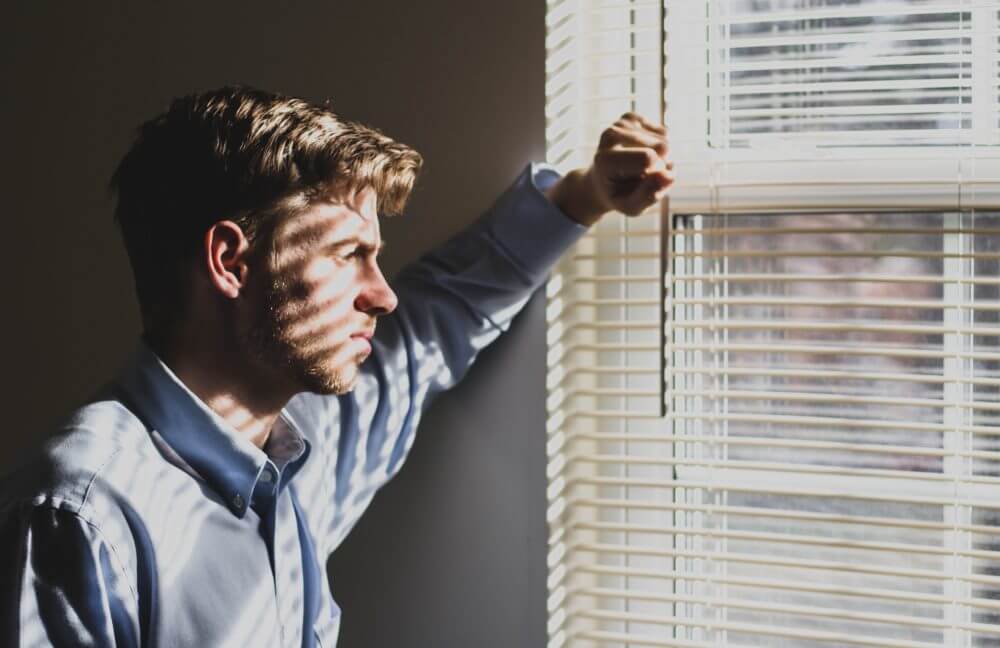 Man watching for visitors