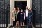 Kate with the external affairs team and members of the Research Community outside Downing Street