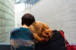 people support sitting help picture of two people sitting on a bench together