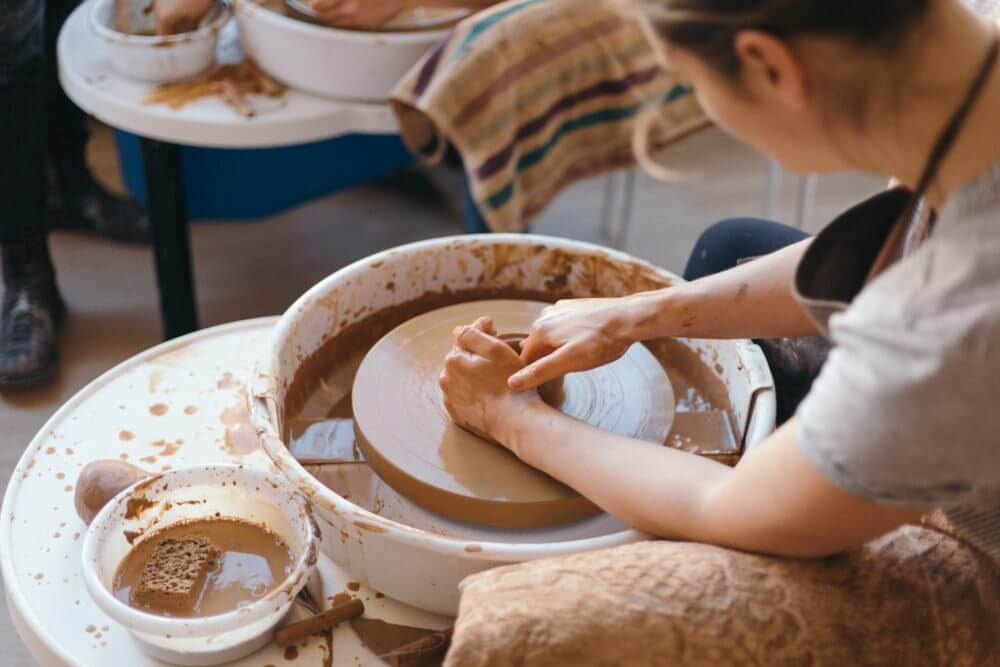picture of a person moulding clay