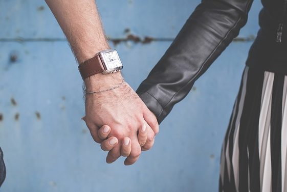 couple holding hands