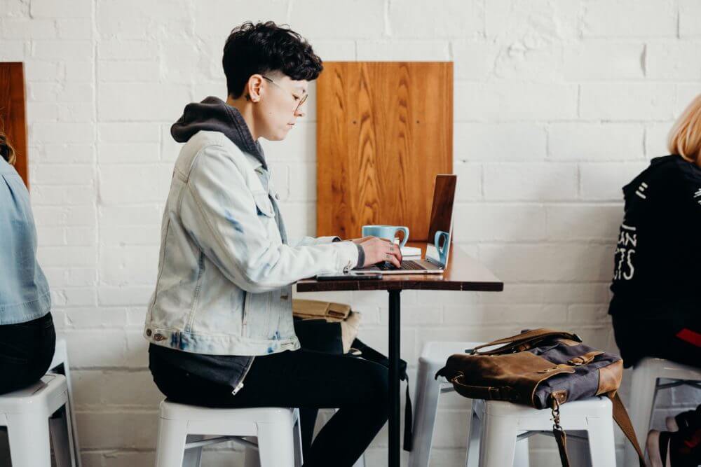 An image of a person using a laptop