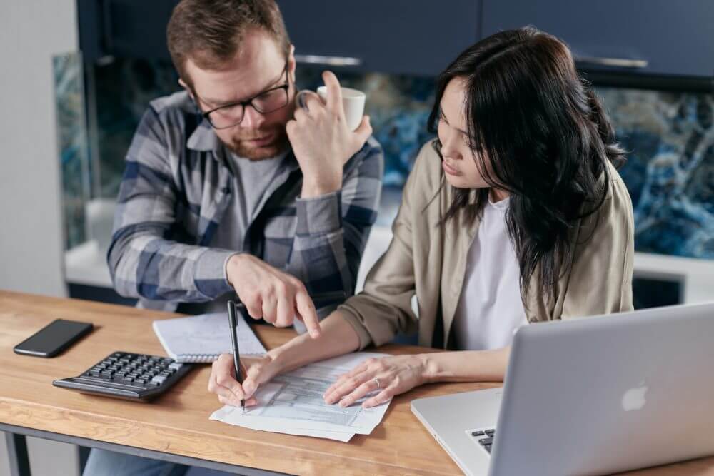 Couple sorting out bills