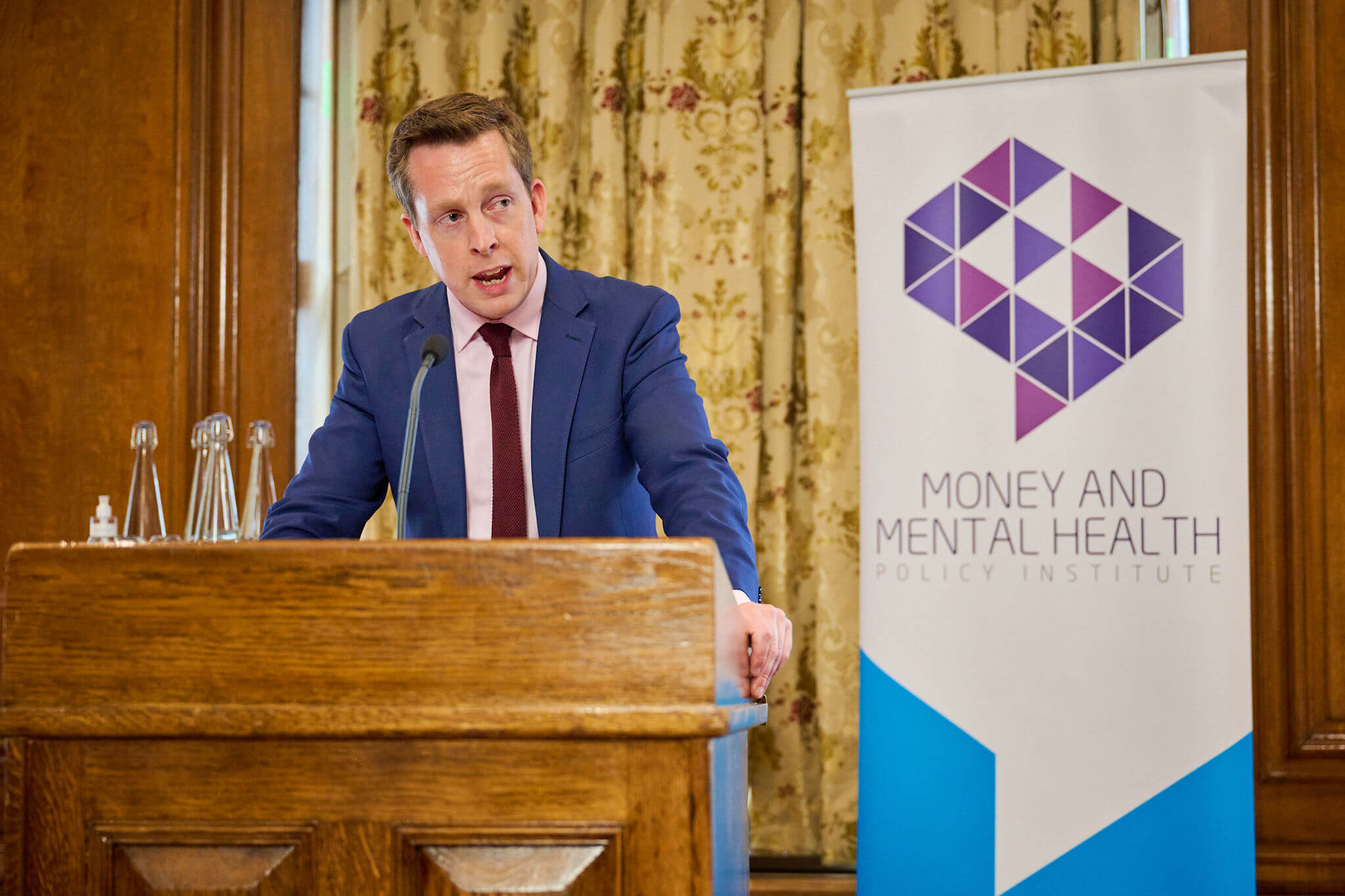 Tom Pursglove speaking at Money and Mental Health's Breaking the cycle launch event.