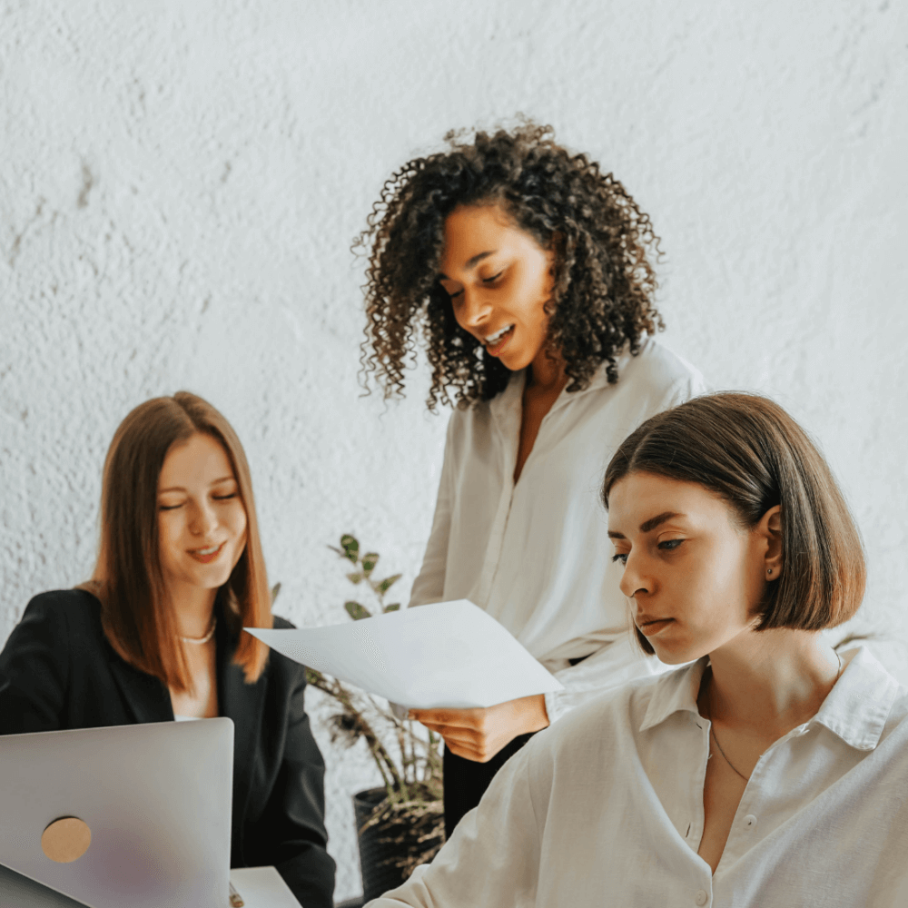 Three women at work.