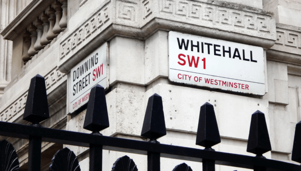 Downing Street and Whitehall street signs.