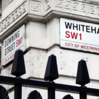 Downing Street and Whitehall street signs.
