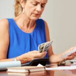 Woman organising money