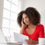 Person reading bill