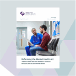The cover of our 'Reforming the Mental Health Act' report. It shows two people talking to each other in a hospital setting.