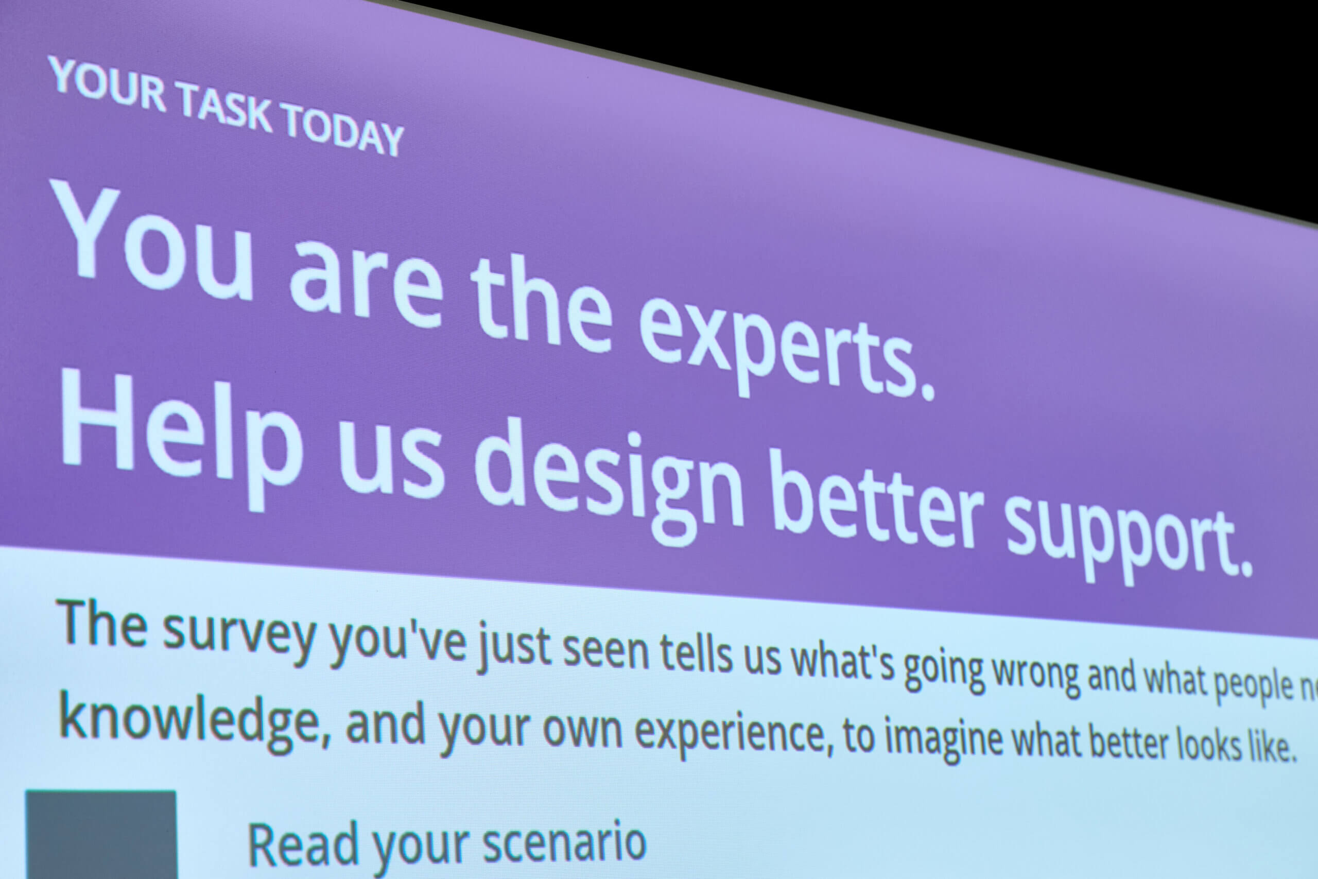 "You are the experts. Help us design better support." A photo from our event focused on improving support services alongside members of our Research Community.