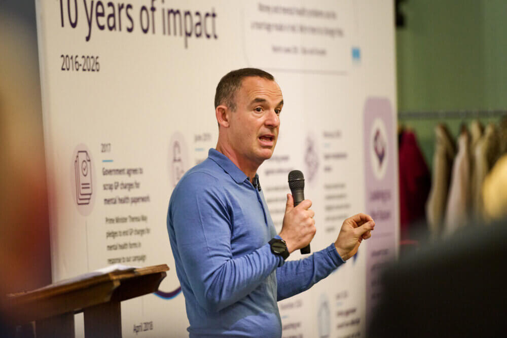 Martin Lewis speaking at Money and Mental Health's 10th anniversary event in Parliament.